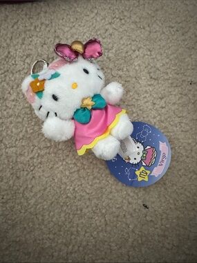 Hello Kitty Pink Dress Plush Keychain with Teal Bow and Gold Accents